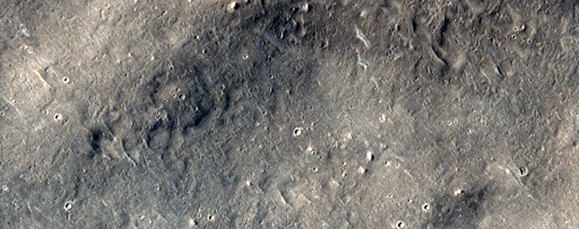 Distant Flow Lobe from Young 40-Kilometer Crater Near Tartarus Montes