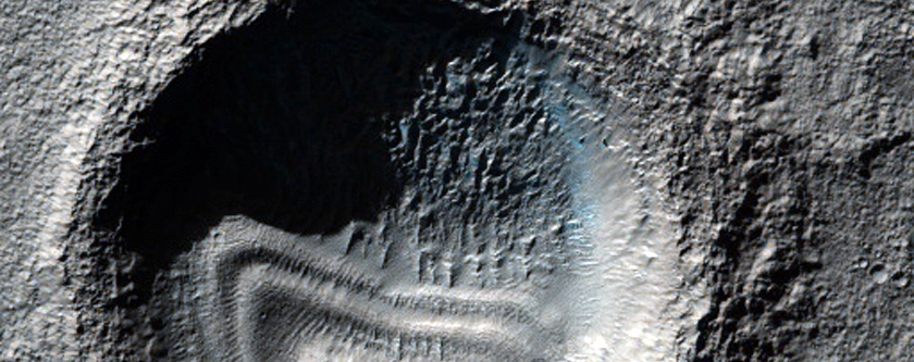 Small Crater with Interior Deposits As Seen in MOC Image M0401430