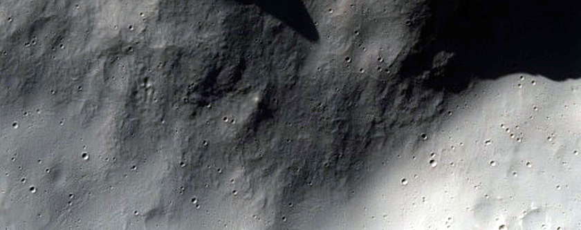 Unusual Double Crater with Well-Preserved Ejecta