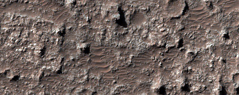 Dark Cones in Kamativi Crater