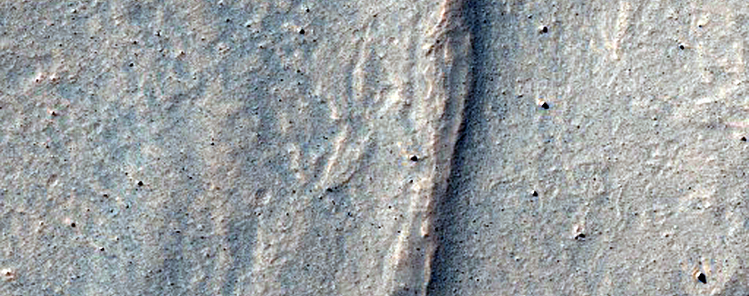Concentric Ridges Near Alcoves Northwest of Oudemans Crater