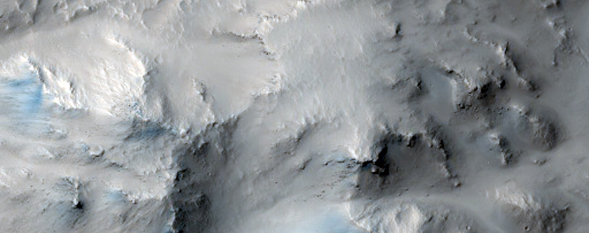 Terrace Channels and Ponded Materials in Isidis Region Crater