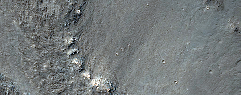 Contact between Fractured Plains and Lobate Lava Flows