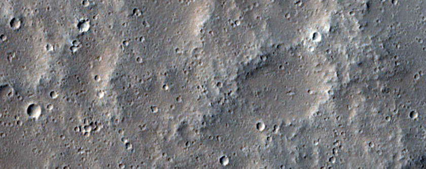Study of Tharsis Region Eolian Features