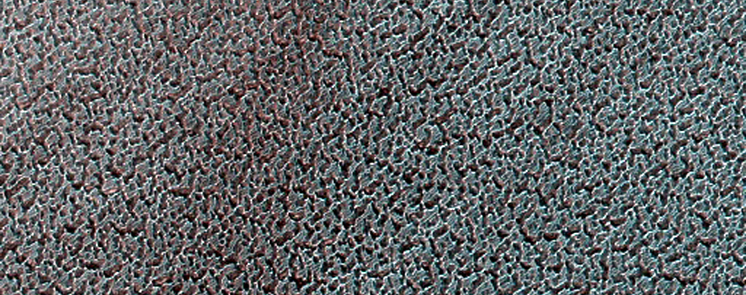 Crater in North Polar Cap