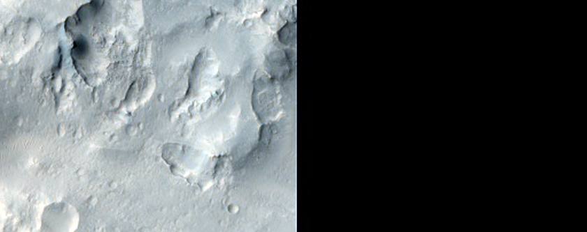 Eastern Rim of Well-Preserved Crater in Isidis Region