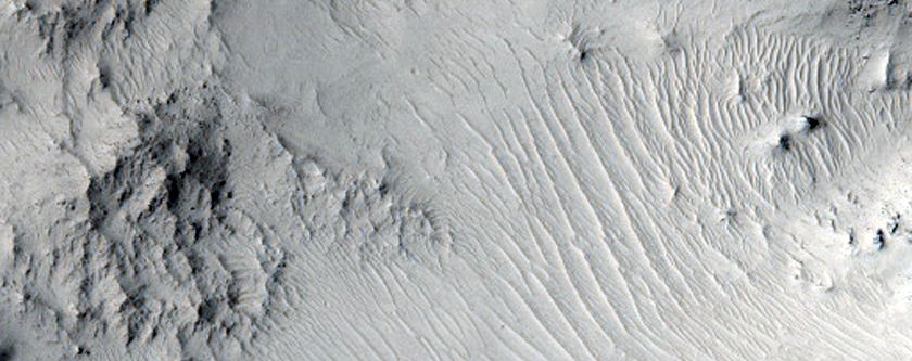 Central Peak of Well-Preserved Crater Northwest of Tartarus Montes