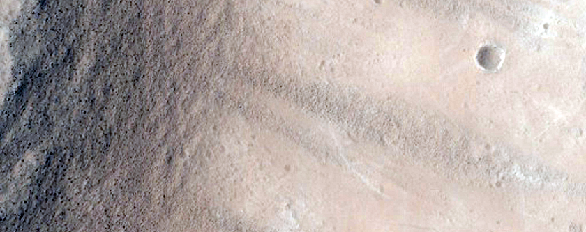 Stratigraphy Exposed in the Ceraunius Fossae