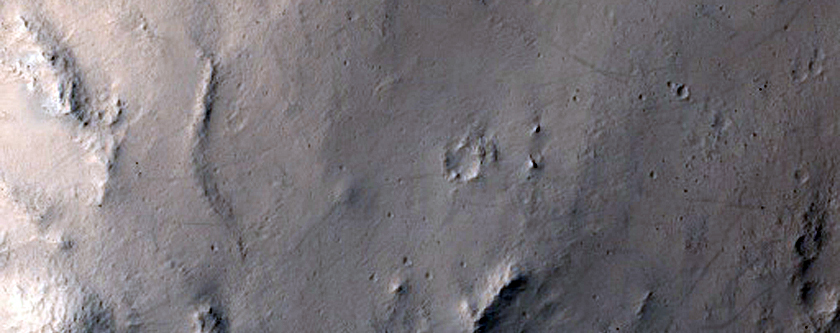 Fresh 10-Kilometer Diameter Impact Crater with Flow Ejecta