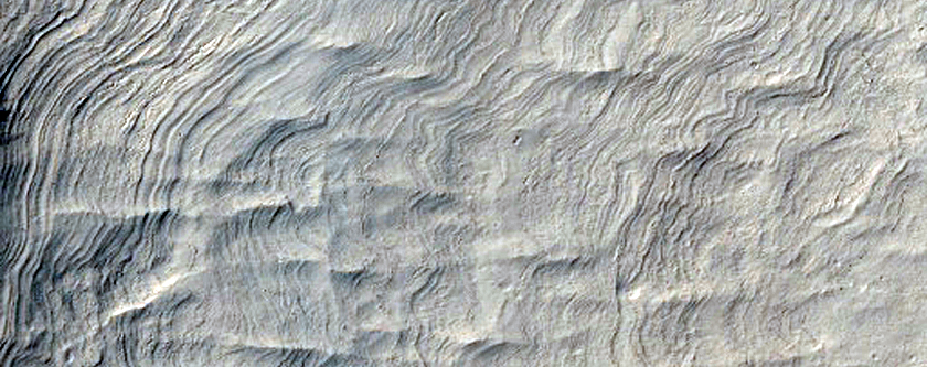 Layering Under Crater Ejecta