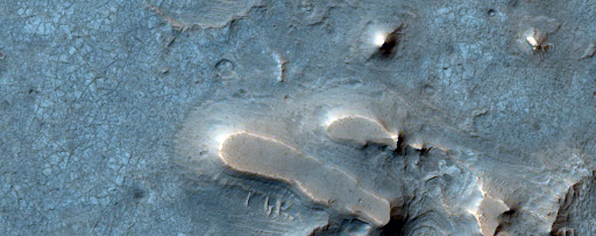 Etched Terrain with Possible Layering West of Juventae Chasma