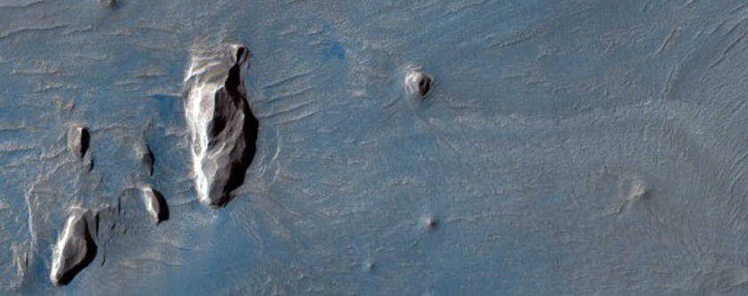 Dark Spot Near Olmpus Mons Volcano