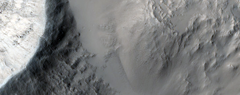 Crater East of Nili Fossae with Flow Ejecta