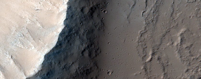 Edge of a Crater in Flows East of Tharsis Region