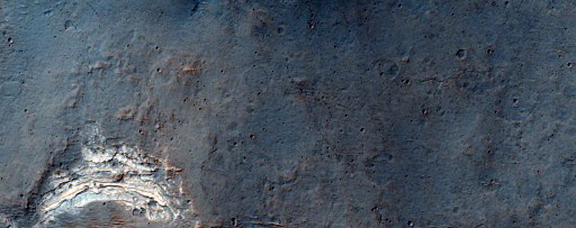 Light-Toned Layered Deposits along Plains South of Ius Chasma