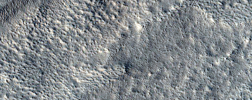 Interaction between Gullies and Mantle on Equator-Facing Slope