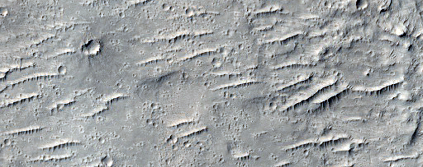 Layered Material on Uplands South of Aeolis Planum