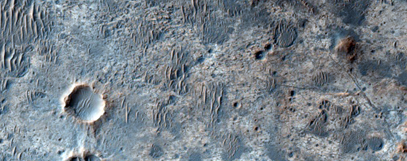 Light-Toned Material Southwest of Miyamoto Crater