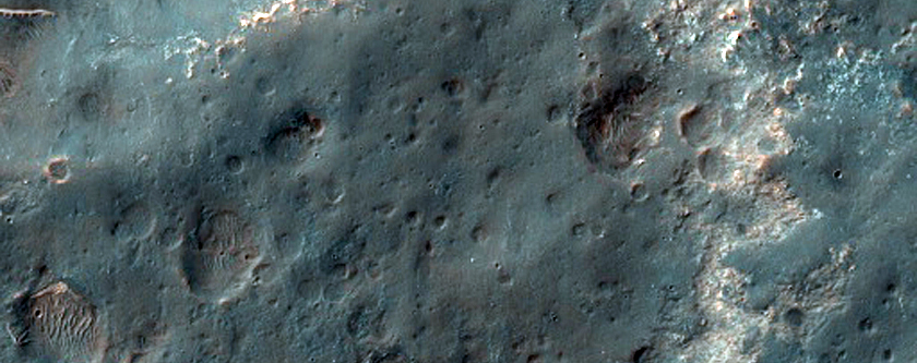 Light-Toned Deposits Near Ganges Chasma