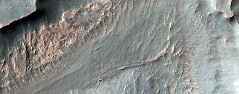 Light-Toned Deposits and Possible Fluvial Channels on Floor of Ius Chasma