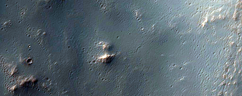 Crater in Aonia Terra Near Transition to Solis Planum