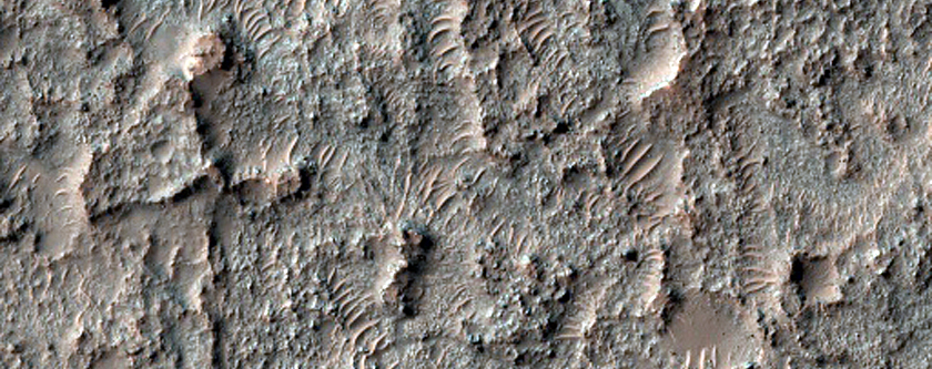 Southern Highlands High Thermal Inertia and Spectrally Distinct Materials