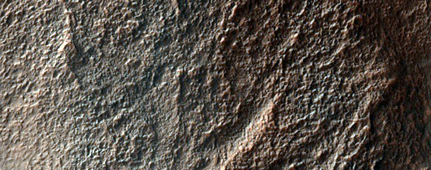 Deeply-Incised Channels in Mantled Crater Walls