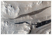 Ponded Lava, Slope Streaks, and Inadvertent Change Detection