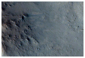 Possible Carbonate-Rich Terrain in Central Stucture of Leighton Crater