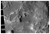 Possible Olivine-Rich Eroded Terrain in Northwest Hellas Region