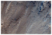 Small Crater Exposed in Cross-Section