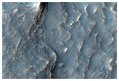 Fan-Shaped Form at Terminus of Sinuous Ridge Seen in THEMIS Image V27262008