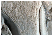 Well-Preserved Gullied Impact Crater on Rim of Larger Crater