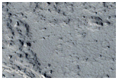 Fractures and Uplifted Portion of Floor of Echus Chasma
