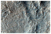 Possible Sulfate or Zeolite-Rich Terrain in Hellas Planitia