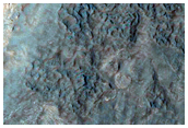 Layered or Banded Material in Hellas Region Basin