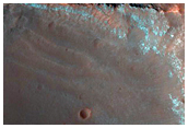 Crater with Channel-Like Feature