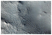 Layered Material North of Cerulli Crater