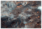 Light-Toned Material in Crater Ejecta Blanket