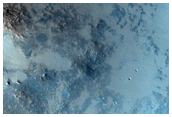 Crater with Rocky Central Structure in Syrtis Major Region