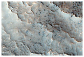 Ridges and Troughs in Valley on Rim of Moreux Crater