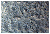 Light-Toned Fan-Like Features in Crater in Chryse Chaos