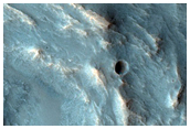 Possible Olivine and Low Calcium Pyroxene Rich Ejecta in Solis Planum