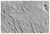 Discontinuous Sinuous Ridge among Crescentic Rock Features