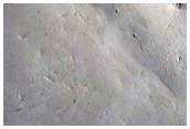 Mass Movement Features in Crater in Themis Images V10284019 and V35416021