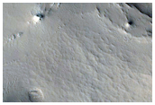 Sinuous Ridge Cut by Craters in Locras Valles Region