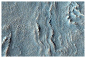 Crater in Thaumasia Fossae