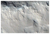 Layered Material in Crater Seen in CTX Image