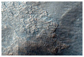 Small Channels on Equator-Facing Slope