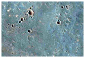 Light-Toned Material along Valley near Coprates Catena